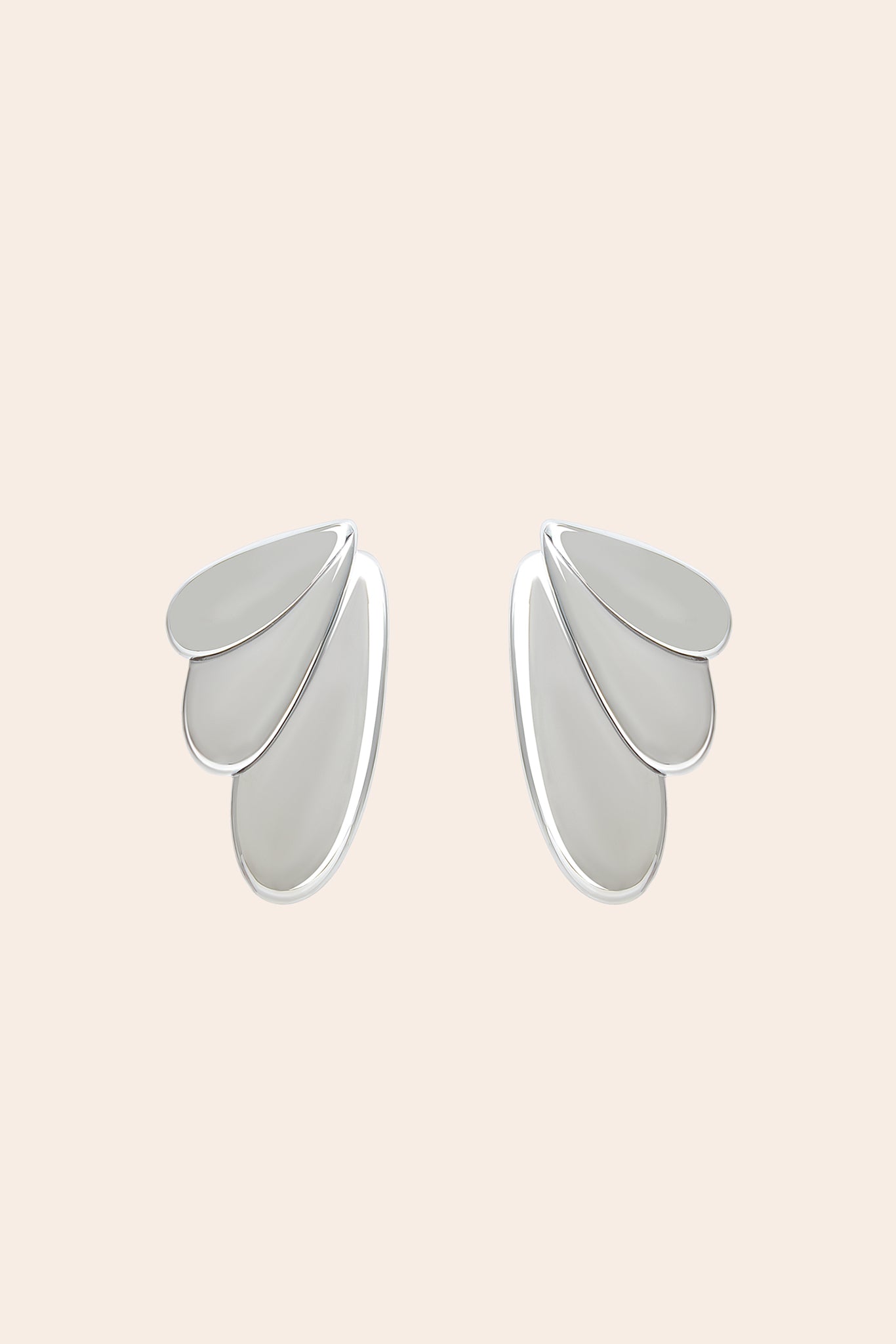 Oversized Wing Clipped Earrings in Silver | Petit Moments