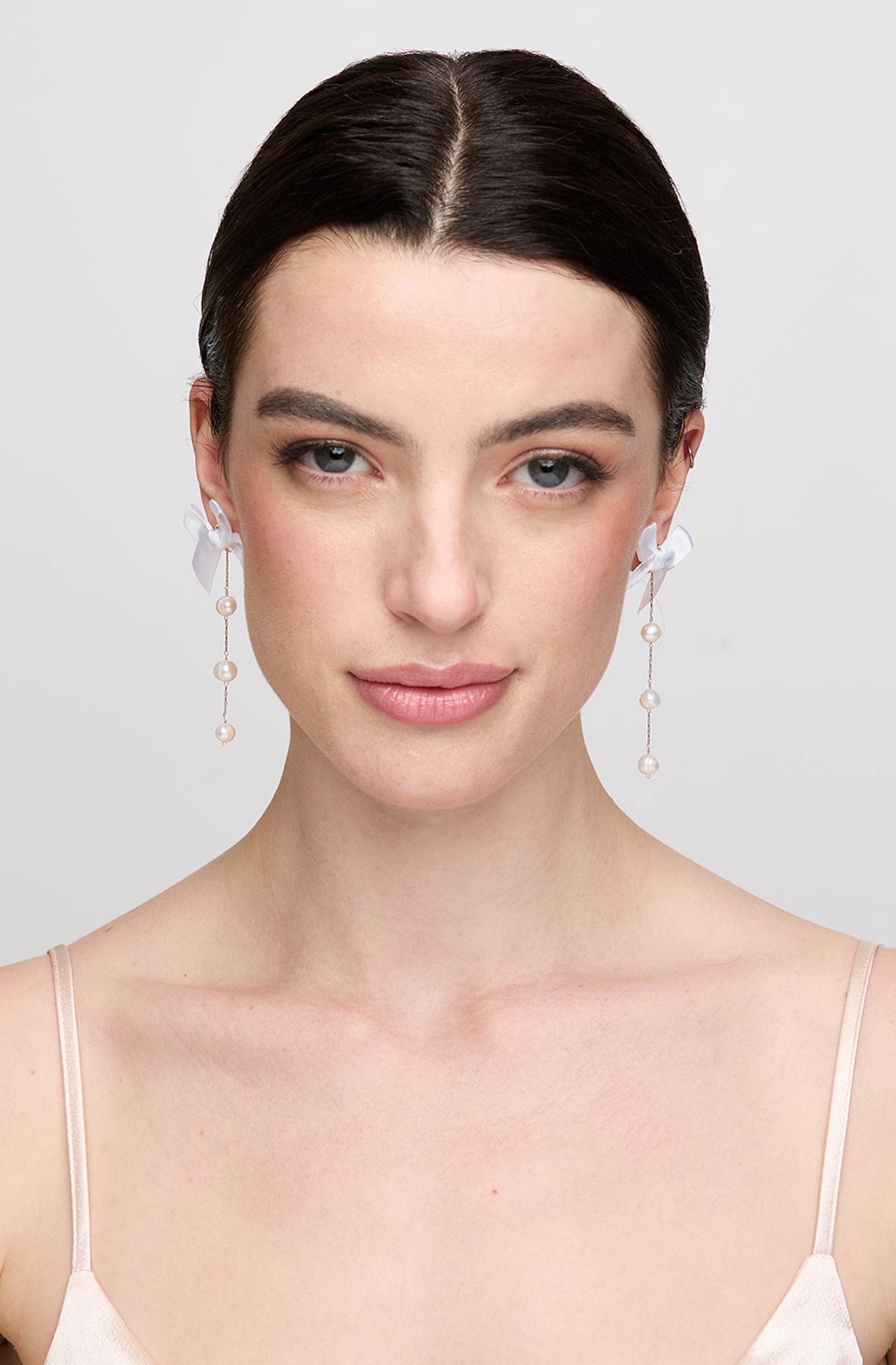 White Bow & Pearl Drop Earrings for Chic Outfits | Petit Moments